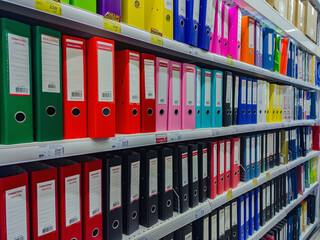 kazan, russia. september 22, 2022. rows of colorful ledgers in an office supply supermarket. set of 