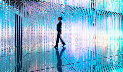 Businesswoman walking in the beautiful bokeh light