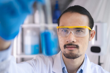 Wall Mural - health care researchers working in life science laboratory, medical science technology research work