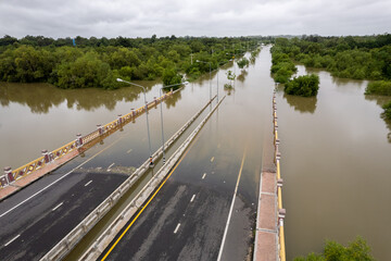 Wall Mural - High-angle view of the Great Flood, Meng District, Thailand, on October 3, 2022, is a photograph from real flooding. With a slight color adjustment