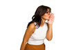 © Asier - Young Indian woman isolated on green chroma background is saying a secret hot braking news and looking aside