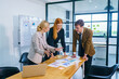 © FotoArtist - Business professionals at work in office