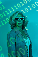 Serious senior programmer under binary code projection