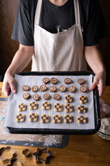 Wall Mural - women showing cookie dough before baking