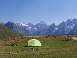 Wall Mural - Camping tent at the Koruldi lakes, beautiful view of Great Caucasus mountains close to Mestia in Upper Svaneti, Georgia.