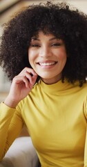 Canvas Print - Vertical video of portrait of happy african american woman