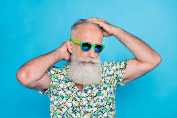 Poster - Closeup photo of old aged bearded grey hair grandfather boyfriend macho wear green ray ban sunglass touching himself isolated on bright blue color background