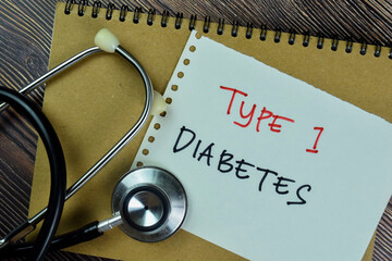 Wall Mural - Concept of Type 1 Diabetes write on sticky notes with Stethoscope isolated on Wooden Table.