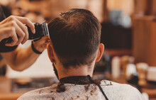Barbershop Concept, Vintage Color. Closeup Man Haircut, Master Does Hair Styling In Barber Shop Back View