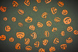 Halloween carved in wood Pumpkins pattern on colored background.
