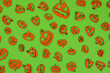 Halloween carved in wood Pumpkins pattern on green screen background.