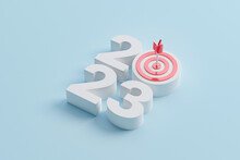New Year Resolution 2023. Goal Achievement. Ambition Aiming Success. Dartboard And Arrow With Number. 3d Rendering Illustration