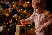 Baby Under Christmas Tree