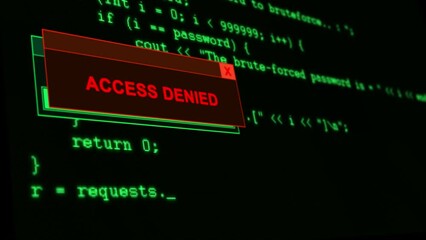 Close-up view of green computer code scrolling on black background with progress bar and access denied message. Soft focus.
