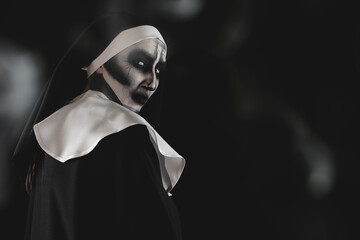 Portrait of scary devilish nun and smoke on black background, space for text. Halloween party look