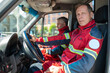 © zinkevych - Paramedical staff seated in the medical emergency vehicle