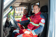 © zinkevych - Paramedics posing for the camera in the medical emergency vehicle