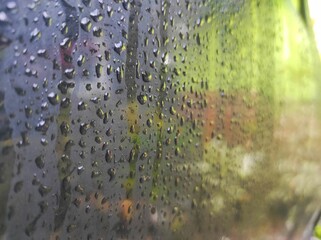 Wall Mural - bodywork of car covered of water drops after storm