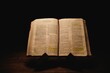 Closeup shot of a historic old Bible open on the Ecclesiastes pages on display in a dark room