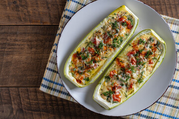 Wall Mural - Zucchini stuffed with shrimps, vegetables and cheese. Baked zucchini boats