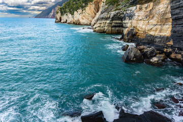 Photograph of a part of the coast of the Cinque Terre, specifically portrays the famous cave of Byron located in the municipality of Portovenere in Liguria Italy. Photograph of October 2022