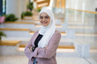 © pikselstock - Portrait of a confident muslim businesswoman in an office building