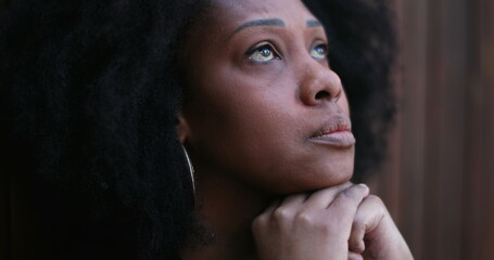 Wall Mural - Worried black African woman close-up face