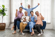 © Jirus - Group of Asian elderly people in a nursing home with young caregiver.