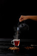 © David Gonzalez - pouring tea into glass