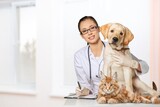 Fototapeta Zwierzęta - Young woman veterinarian hold a dog pet in clinic