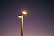 © Cavan Images - Modern lamp on dark background