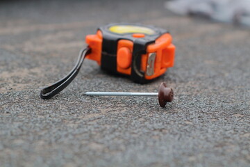 tools on the wooden roof with shingle