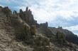 majestic rocks from volcanic columnar basalt against the sky, natural landscape of Kunashir island