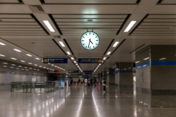 clock at subway station. large clock face public transport on a train station platform. analog clock