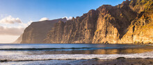Amazing View From Beach In Los Gigantes With High Cliffs On The Sunset. Location: Los Gigantes, Tenerife, Canary Islands. Artistic Picture. Beauty World.