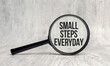 small steps everyday word on magnifying glass
