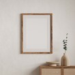 © kitipol - Vertical wood frame mockup in living room interior with light reflection. 3d rendering, 3d illustration
