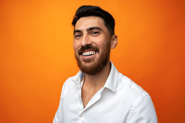 Poster - Portrait of handsome smiling businessman on studio background