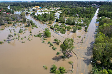 Wall Mural - High-angle view of the Great Flood, Meng District, Thailand, on October 3, 2022, is a photograph from real flooding. With a slight color adjustment
