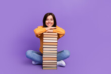 Full Length Photo Of Attractive Nice Smart Intellectual Woman Sitting Chill Vacation Pile Books Empty Space New Ad Library Isolated On Purple Color Background