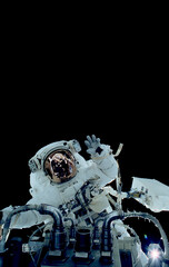 Wall Mural - Space suits isolated on space background. Elements of this image furnished by NASA.
