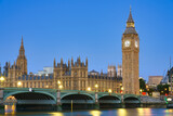 Fototapeta Londyn - Big Ben and Westminster bridge at dawn in London. England
