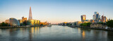 Fototapeta Londyn - Skyline panorama of London south bank and financial district at sunrise