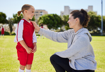 Poster - Girl, coach and soccer for motivation, inspiration and help on field for better performance in sport. Woman, child and football together on grass talking for advice, learning and guidance in game