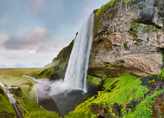 Wall Mural - Waterfall Seljalandsfoss in Iceland - panoramic view