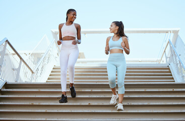 Poster - Fitness women, running steps and exercise for healthy lifestyle, wellness and marathon training in urban city outdoors. Happy athletes, runners and friends cardiovascular workout down stairs together