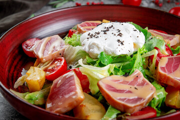 Canvas Print - Strachatella. Sea fresh green salad mix with tuna, poached egg, cherry tomatoes and potatoes.