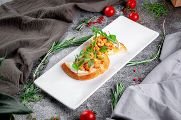 Canvas Print - Delicious snacks. Toasted croutons with squid. Bruschetta with seafood and lettuce