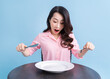 © Timeimage - Young Asian woman eating, eat concept
