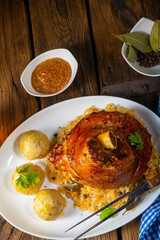 Wall Mural - pork knuckle with sauerkraut and sweet mustard